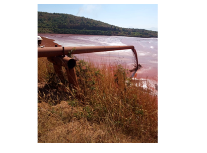 Figure 1: Disposal of red mud into the red mud pond